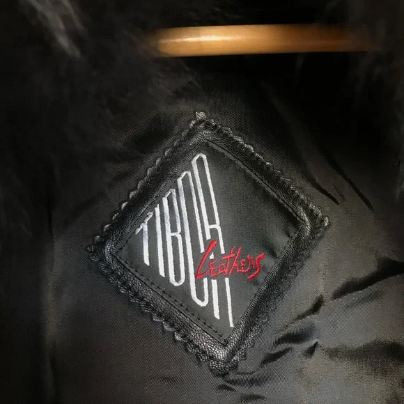 Ladies Black leather dress coat with fur